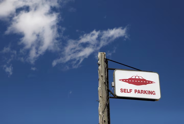 A parking sign at the Little A'Le'Inn near Area 51, in Rachel, Nevada, U.S. September 19, 2019. REUTERS/Jim Urquhart