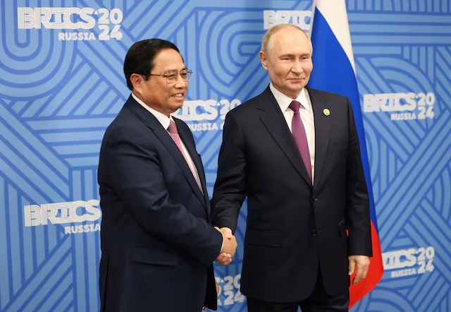 Russian President Vladimir Putin shakes hands with Vietnamese Prime Minister Pham Minh Chinh during a meeting on the sidelines of the BRICS summit in Kazan, Russia October 24, 2024. Sputnik/Alexander Kazakov/Pool via REUTERS Russian President Vladimir Putin shakes hands with Vietnamese Prime Minister Pham Minh Chinh during a meeting on the sidelines of the BRICS summit in Kazan, Russia October 24, 2024. Sputnik/Alexander Kazakov/Pool via REUTERS