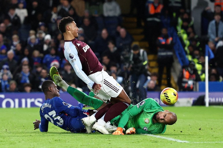 Ollie Watkins scores against Trevoh Chalobah, left,  and Robert Sanchez. REUTERS