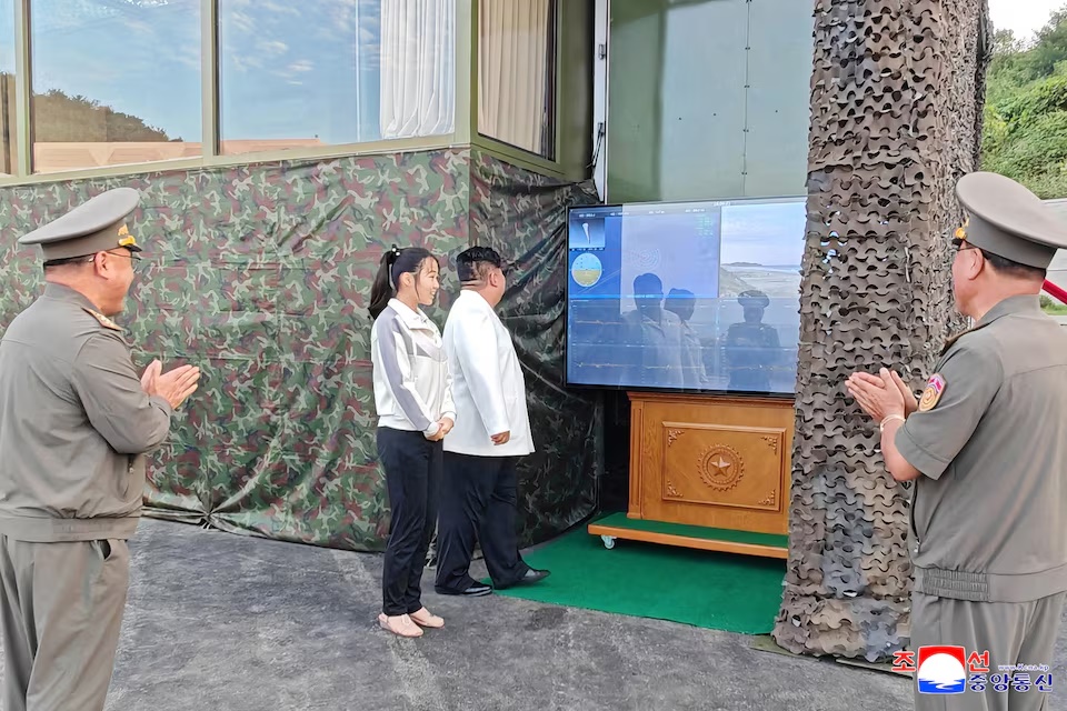 North Korean leader Kim Jong Un, accompanied by his daughter Kim Ju Ae, attends a test of a new type of weapon at an undisclosed location, North Korea, September 20, 2026, in this picture released by North Korea's official Korean Central News Agency. KCNA via REUTERS