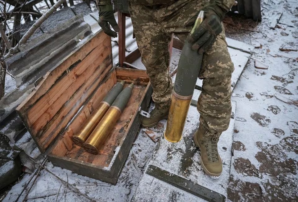 A Ukrainian servicemember of 80th Separate Galician Air Assault Brigade prepares shells to fire a L119 howitzer towards Russian troops, amid Russia's attack on Ukraine, at a position near Bakhmut in Donetsk region, Ukraine. (Reuters) A Ukrainian servicemember of 80th Separate Galician Air Assault Brigade prepares shells to fire a L119 howitzer towards Russian troops, amid Russia's attack on Ukraine, at a position near Bakhmut in Donetsk region, Ukraine. (Reuters)