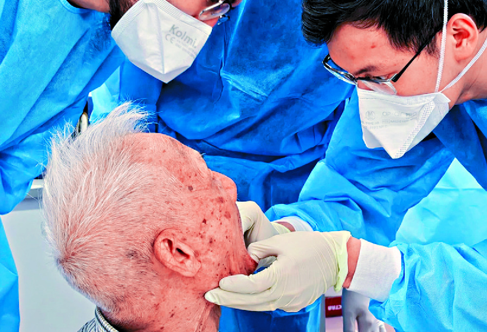 A care team of dentists looks after the needs of the elderly. A care team of dentists looks after the needs of the elderly.