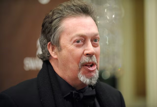 Actor Tim Curry attends the 10th annual Costume Designers Guild Awards in Beverly Hills, California February 19, 2008. REUTERS/Phil McCarten/File Photo