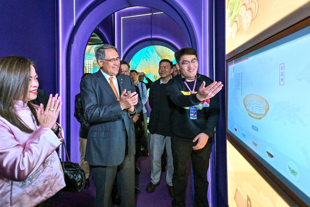 Guests tour at the ‘FLASH! The Palace Museum - A Pop-Up Digital Experience’ exhibition.