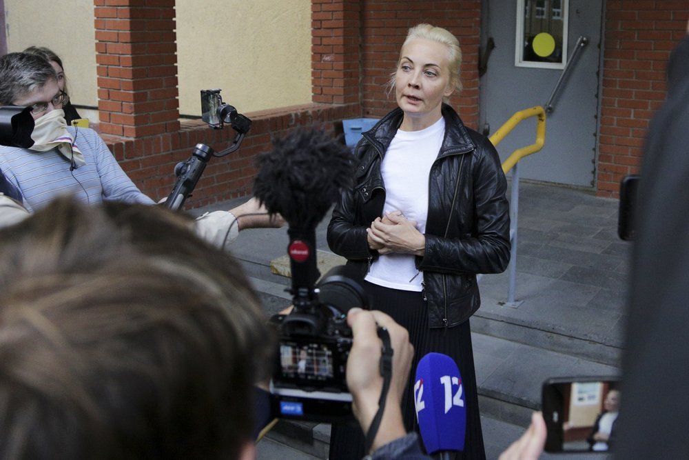 Alexei Navalny's wife Yulia answers to journalists' questions at the Omsk Ambulance Hospital No. 1, intensive care unit, where Alexei Navalny was hospitalized in Omsk, Russia, Friday.