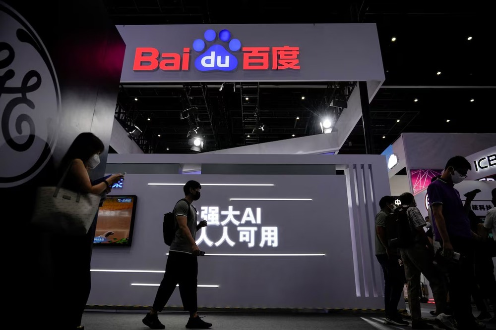 People stand by a sign of Baidu during World Artificial Intelligence Conference, following the coronavirus disease (COVID-19) outbreak, in Shanghai, China, September 1, 2022. REUTERS People stand by a sign of Baidu during World Artificial Intelligence Conference, following the coronavirus disease (COVID-19) outbreak, in Shanghai, China, September 1, 2022. REUTERS