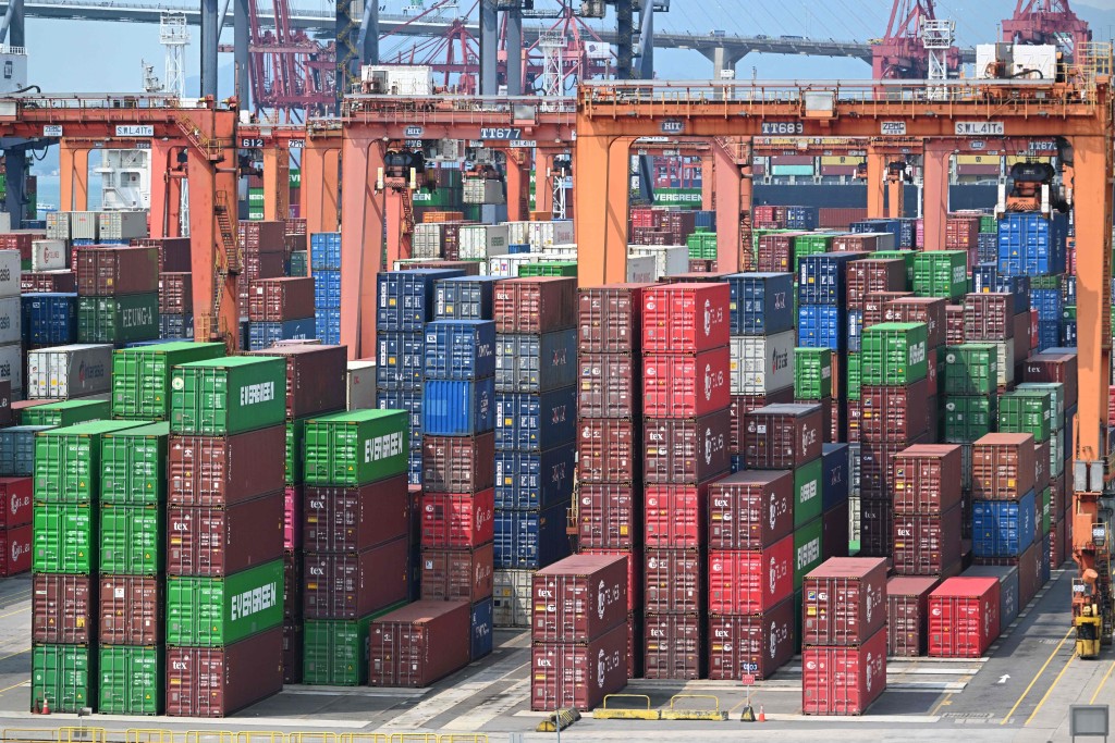Containers are seen stacked up at Kwai Chung Container terminal in Hong Kong on April 2, 2025. AFP