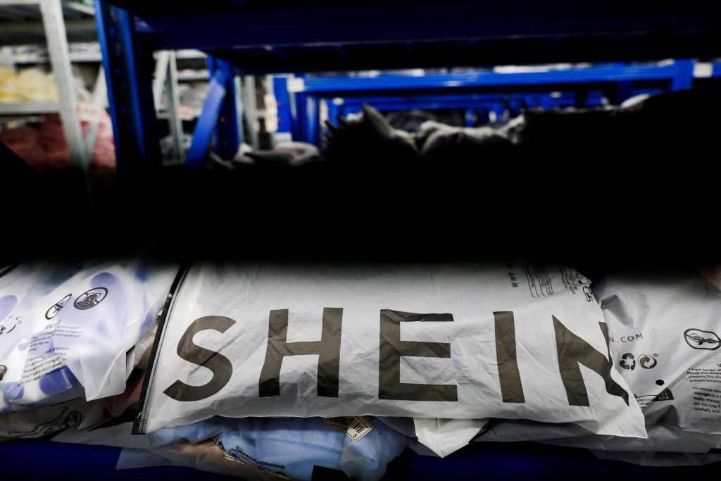 Packs of clothing are displayed at a garment factory for Shein in  Guangzhou, China, July 27, 2026. REUTERS/Go Nakamura