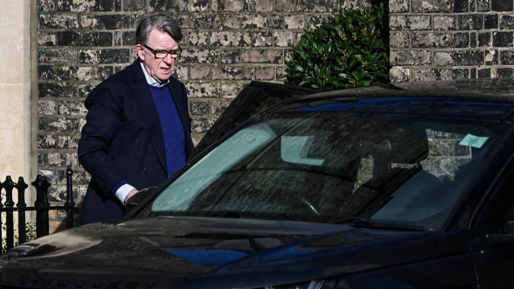 Former British Ambassador to the U.S. Peter Mandelson enters a vehicle outside a reported residence. FILE PHOTO/REUTERS
