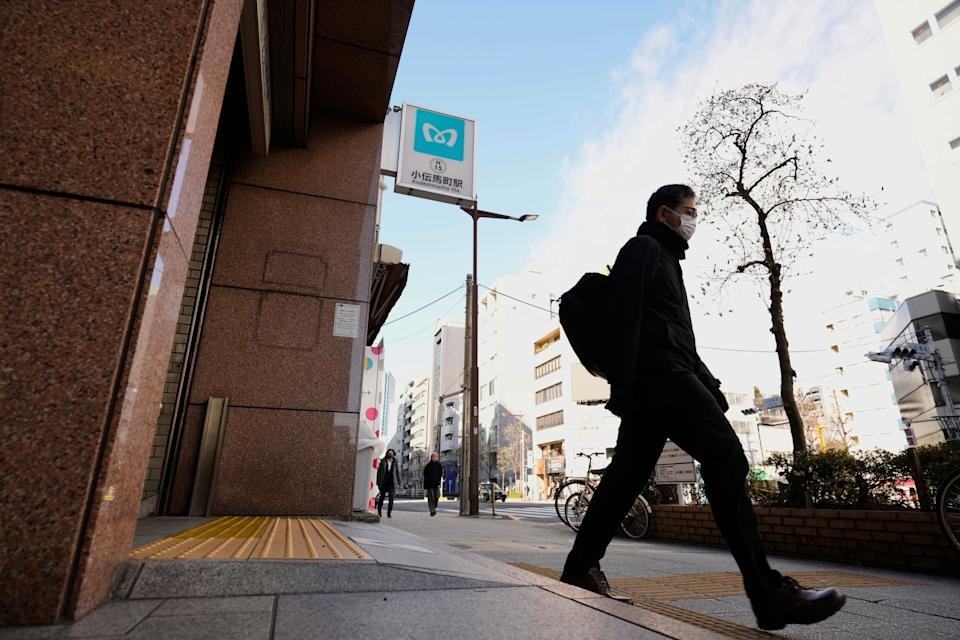 A subway sign, center top, is seen at the Kodenmacho station, that was affected by a deadly sarin nerve gas attack 30 years ago, in Tokyo, as a passenger gets out of its exit Thursday, March 20, 2025. (AP Photo/Hiro Komae) A subway sign, center top, is seen at the Kodenmacho station, that was affected by a deadly sarin nerve gas attack 30 years ago, in Tokyo, as a passenger gets out of its exit Thursday, March 20, 2025. (AP Photo/Hiro Komae)