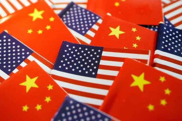 Flags of U.S. and China are seen in this illustration picture taken August 2, 2022. REUTERS/Florence Lo/Illustration//File Photo Flags of U.S. and China are seen in this illustration picture taken August 2, 2022. REUTERS/Florence Lo/Illustration//File Photo