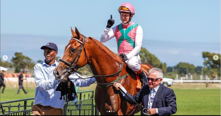 See It Again, with jockey Pierre Strydom in the saddle, poses with Michael Roberts, right. (Photo from Michael Roberts' social media)