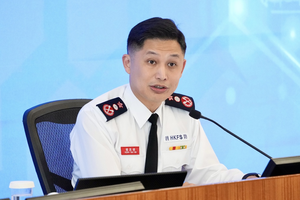 The blaze was believed to have started on the first floor of the New Lucky House building, bottom, after materials there caught fire. Sing Tao The blaze was believed to have started on the first floor of the New Lucky House building, bottom, after materials there caught fire. Sing Tao