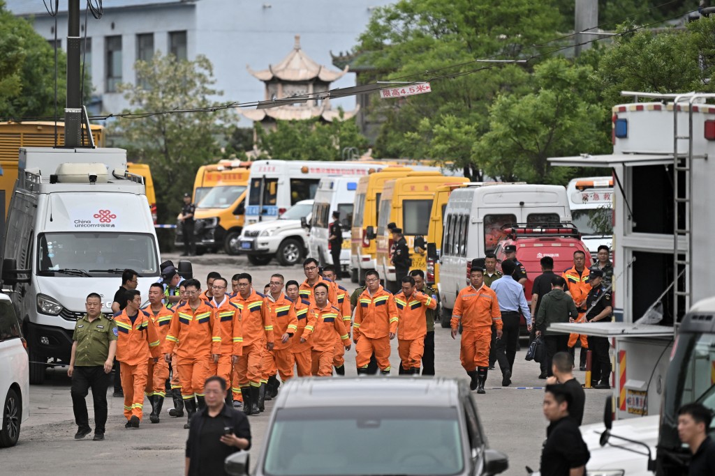 Rescue workers arrive to carry out rescue operations following a gas explosion at the Liushenyu coal mine in Changzhi, in northern China's Shanxi province on May 23, 2026. (AFP)