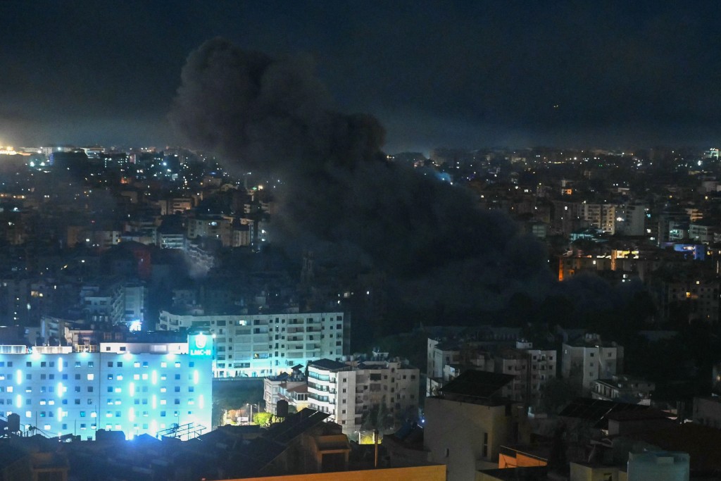 Photo by FADEL ITANI / AFP  Smoke rises from the site of an Israeli airstrike that targeted Beirut's southern suburbs Al-Jamous neighbourhood on March 6, 2026.