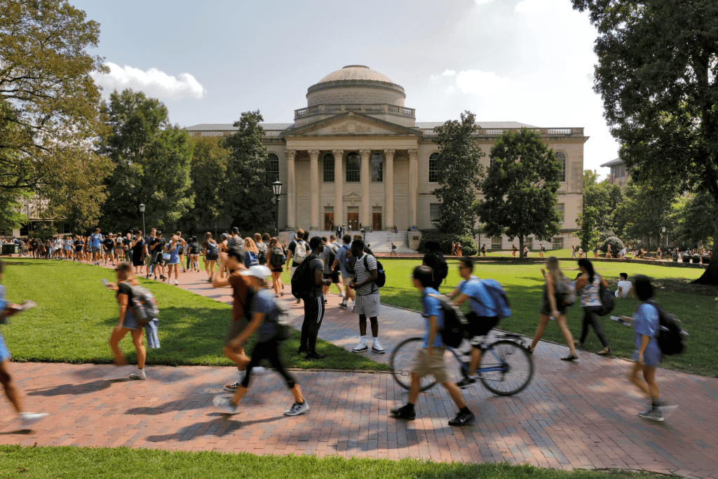 Students walk past Wilson Library on the campus of the University of North Carolina at Chapel Hill, North Carolina, U.S., September 20, 2018. Picture taken on September 20, 2018. REUTERS/Jonathan Drake