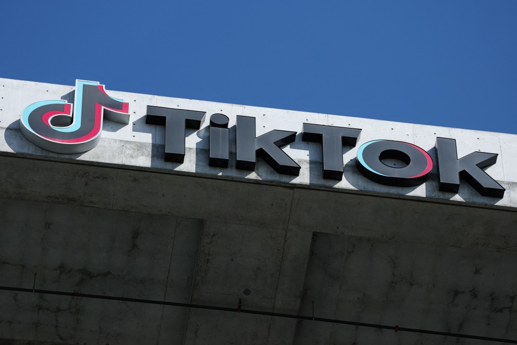 Photo by PATRICK T. FALLON / AFP. The TikTok logo is displayed on signage outside TikTok social media app company offices in Culver City, California on September 30, 2025.