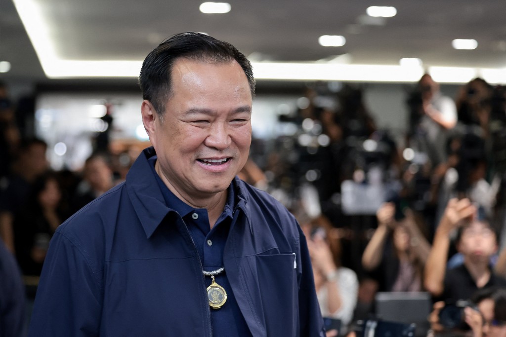 Thailand's caretaker Prime Minister Anutin Charnvirakul, Bhumjaithai Party leader and prime ministerial candidate, arrives for a press conference at the party headquarters on the day of the general election, in Bangkok, Thailand, February 8, 2026. (Reuters)