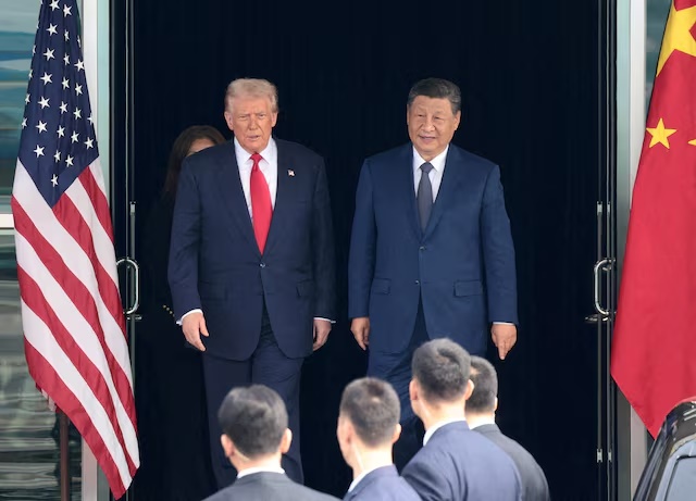 U.S. President Donald Trump and Chinese President Xi Jinping walk as they leave after a bilateral meeting at Gimhae International Airport, on the sidelines of the Asia-Pacific Economic Cooperation (APEC) summit, in Busan, South Korea, October 30, 2025. REUTERS/Evelyn Hockstein