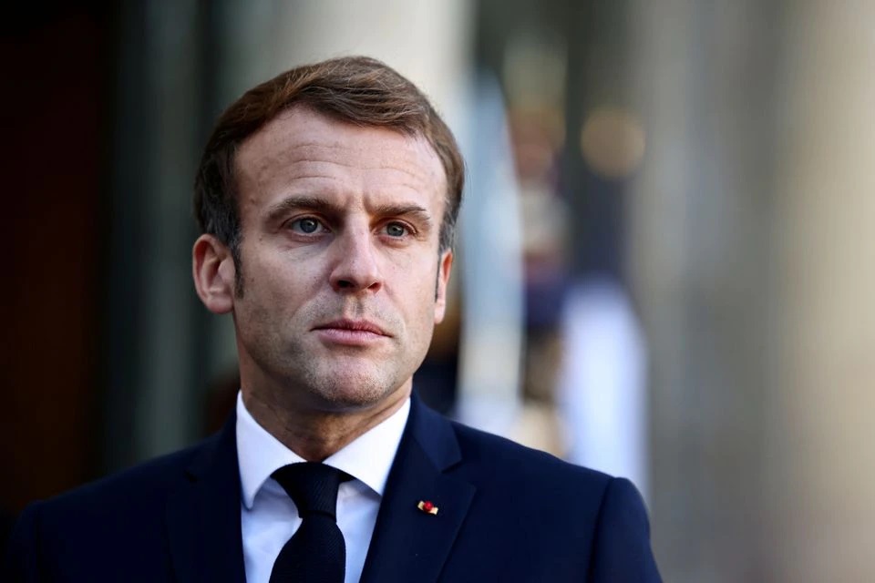 French President Emmanuel Macron looks on during a news conference with Benin's President Patrice Talon after the signing of an agreement about the return of looted cultural artefacts to the African country, at the Elysee Palace in Paris, France, November 9, 2021. (Reuters) French President Emmanuel Macron looks on during a news conference with Benin's President Patrice Talon after the signing of an agreement about the return of looted cultural artefacts to the African country, at the Elysee Palace in Paris, France, November 9, 2021. (Reuters)