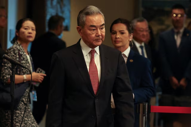 Chinese Foreign Minister Wang Yi arrives to speak with the media at the U.N. headquarters in New York City, U.S., May 26, 2026. REUTERS/Shannon Stapleton