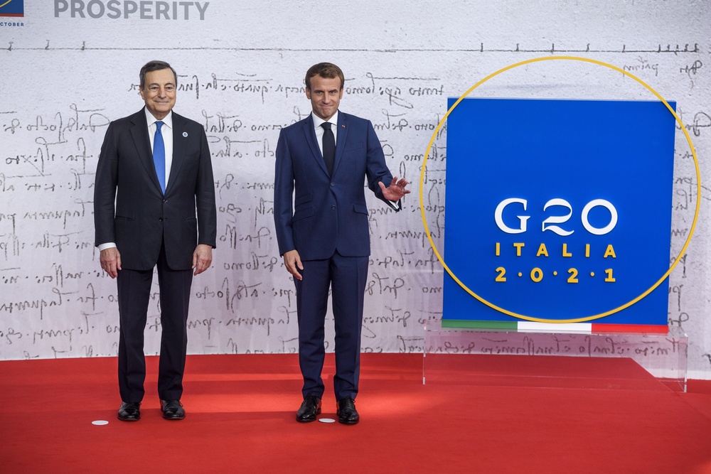 Mario Draghi, left, and Emmanuel Macron, at the G20 summit in Rome, Italy. (Bloomberg) Mario Draghi, left, and Emmanuel Macron, at the G20 summit in Rome, Italy. (Bloomberg)