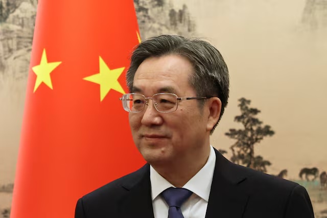 Chinese Vice Premier Ding Xuexiang poses for pictures with European Commission Executive Vice-President for a Clean, Just and Competitive Transition Teresa Ribera (not pictured) at the Diaoyutai State Guesthouse in Beijing, China July 14, 2025. REUTERS/Florence Lo/Pool