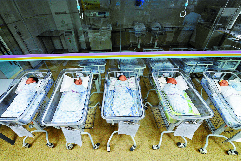 Newborn babies in Hefei, Anhui. Reuters Newborn babies in Hefei, Anhui. Reuters