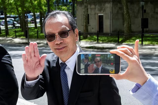 Lu Jianwang, a U.S. citizen charged with conspiring to act as an agent of the Chinese government by helping set up a Chinese 'secret police station' arrives at Brooklyn federal court during his trial in New York City, U.S., May 12, 2026. REUTERS/Eduardo Munoz/File Photo