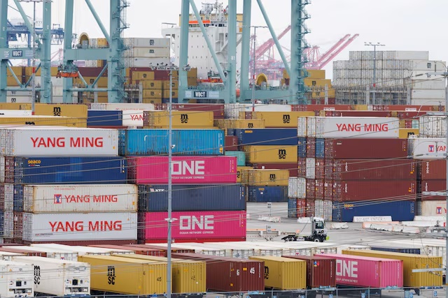 Shipping containers from China sit at the Port of Los Angeles in San Pedro, California, U.S., November 5, 2025. REUTERS/Mike Blake