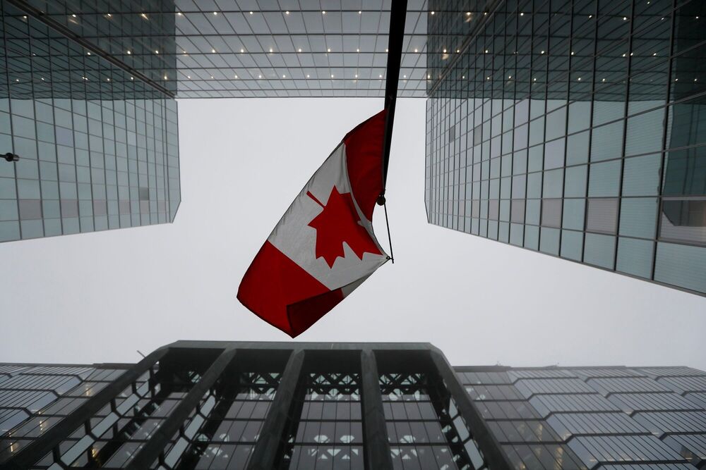 The Canadian flag near the Bank of Canada in Ottawa, Ontario, Canada, on Wednesday, Dec. 11, 2024. Bloomberg The Canadian flag near the Bank of Canada in Ottawa, Ontario, Canada, on Wednesday, Dec. 11, 2024. Bloomberg