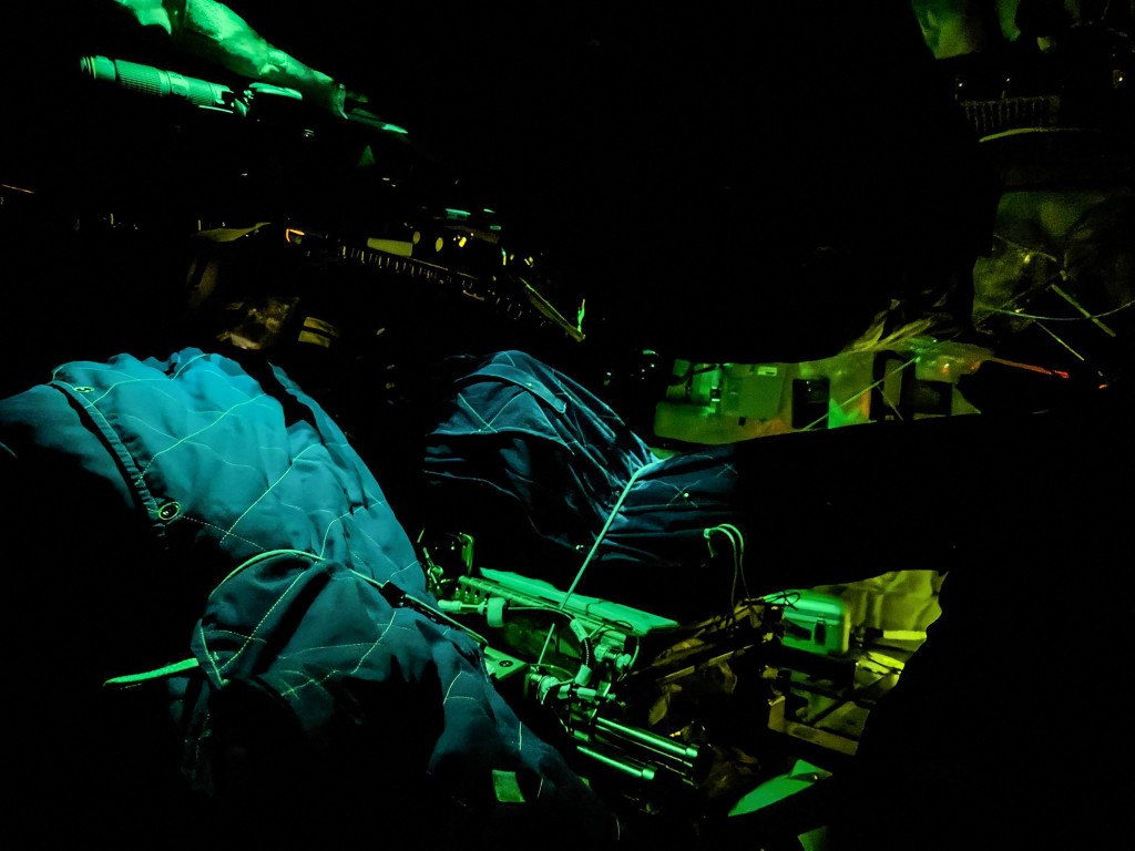 Photo by HANDOUT / NASA / AFP  This handout picture released on April 6, 2026, by NASA shows Artemis II crewmember sleeping bags illuminated inside the Orion spacecraft on April 4, 2026.