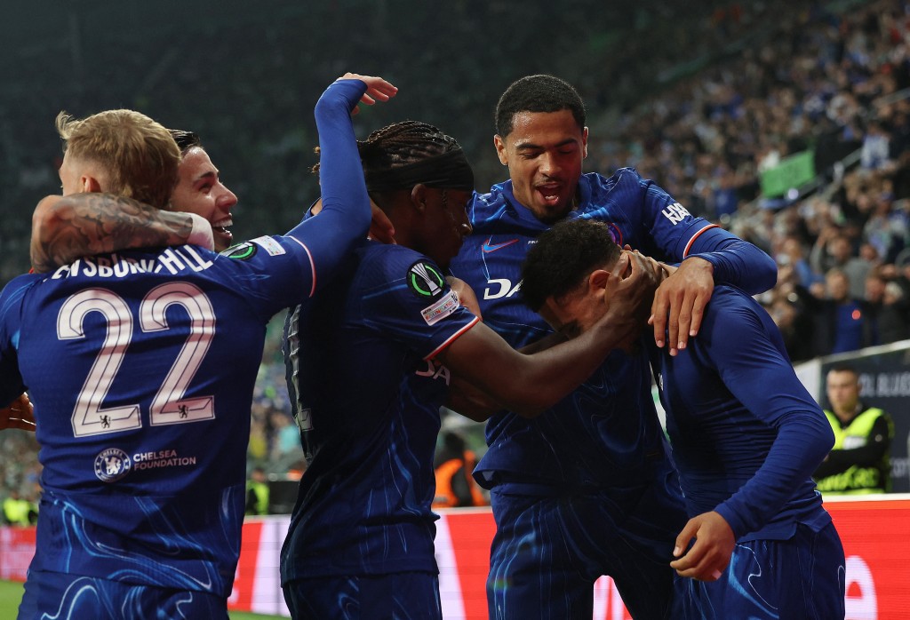 Chelsea's Jadon Sancho celebrates scoring their third goal with teammates. (Reuters)