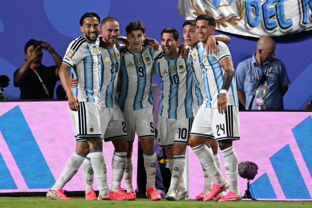 Argentina's forward Lionel Messi celebrates with teammates scoring his team's second goal during the 2026 World Cup Group J football match between Argentina and Algeria. (AFP)