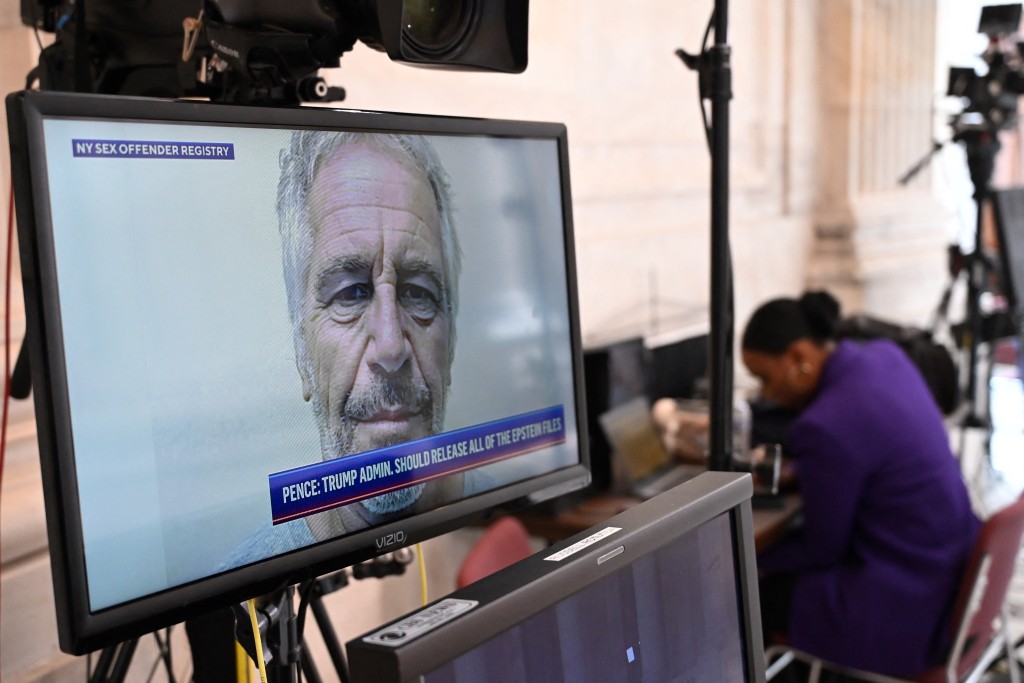 A mugshot of Jeffrey Epstein, former financier and convicted sex offender, is seen on a television at the US Capitol in Washington, DC, on July 16, 2025. (Photo by Alex WROBLEWSKI / AFP)