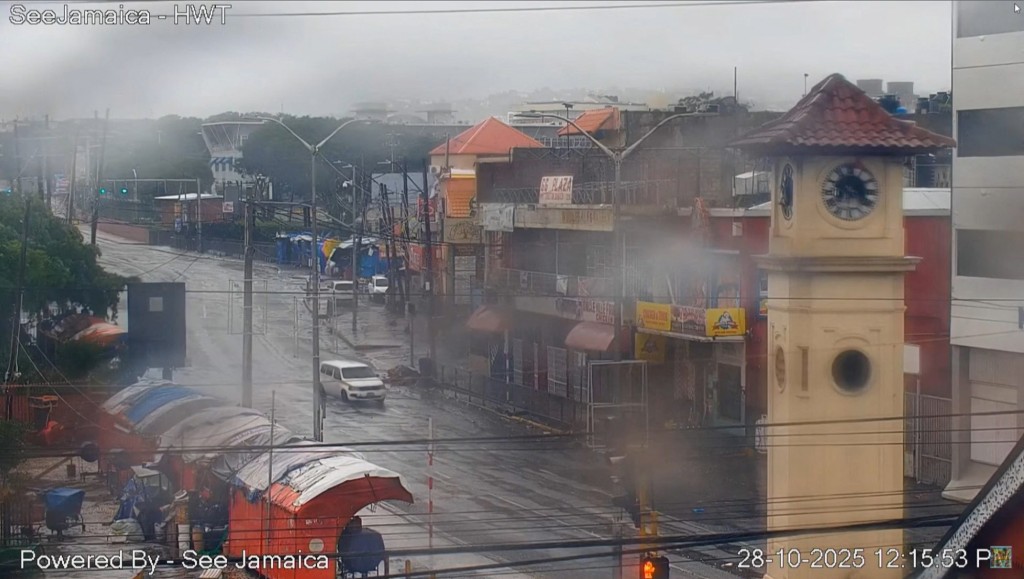 Photo by HANDOUT / SEE JAMAICA / AFP  Video grab courtesy of a SeeJamaica CCTV camera shows downtown Kingston on October 28, 2025 as Hurricane Melissa makes landfall in Jamaica.