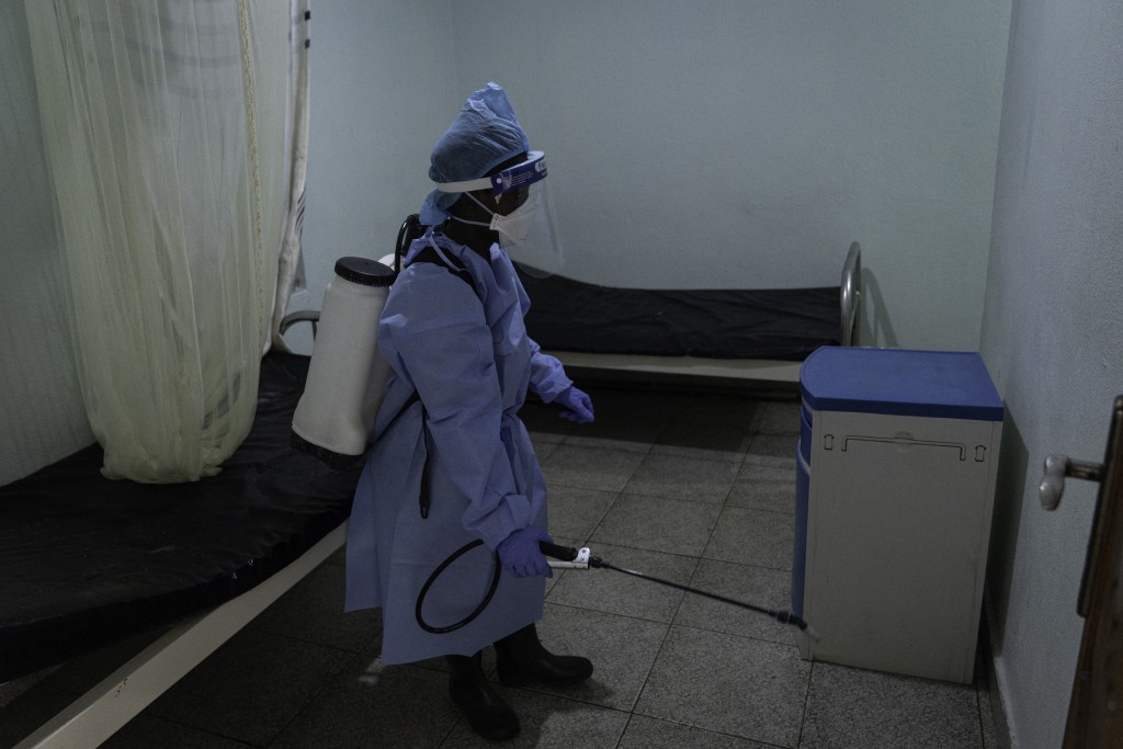 Doctors Without Border (MSF) personnel at the Elikya clinic Ebola treatment center disinfects a hospital rooms for Ebola patients in Bunia, in the eastern Democratic Republic of the Congo, on June 5, 2026. (Photo by GLODY MURHABAZI / AFP)