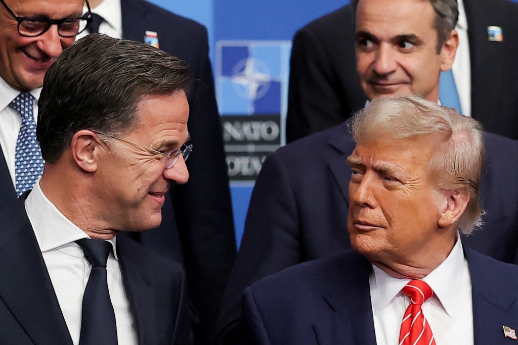 U.S. President Donald Trump and NATO Secretary General Mark Rutte gather for a family photo during a NATO leaders summit in The Hague, Netherlands June 25, 2025. (Reuters)