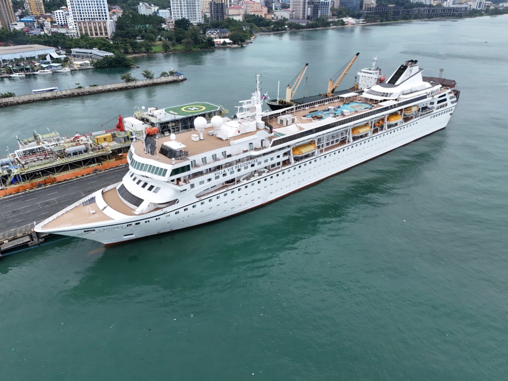 Photo by SUY SE / AFP  An aerial view shows the Villa Vie Residences' cruise ship Odyssey docked at Sihanoukville port in Preah Sihanouk province on October 28, 2026.