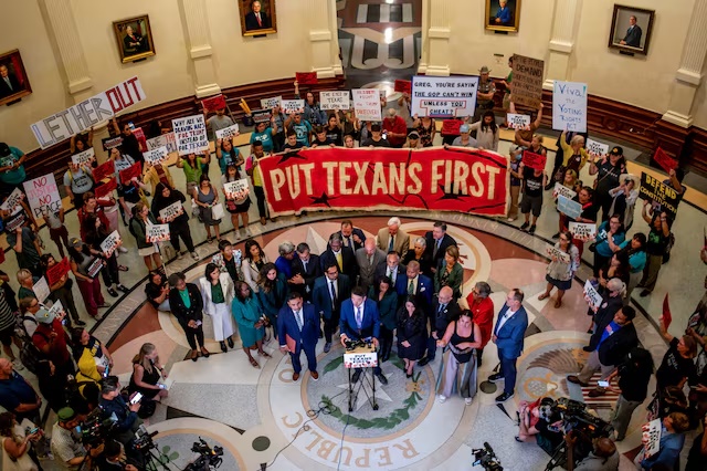 Democratic Texas Representative Gene Wu speaks during a press conference after the passing of H.B. 4, during a session in which Democratic lawmakers, who had left the state to prevent Republicans from redrawing Texas's 38 congressional districts, returned to the Texas State Capitol in Austin, Texas, U.S., August 20, 2025. REUTERS/Sergio Flores