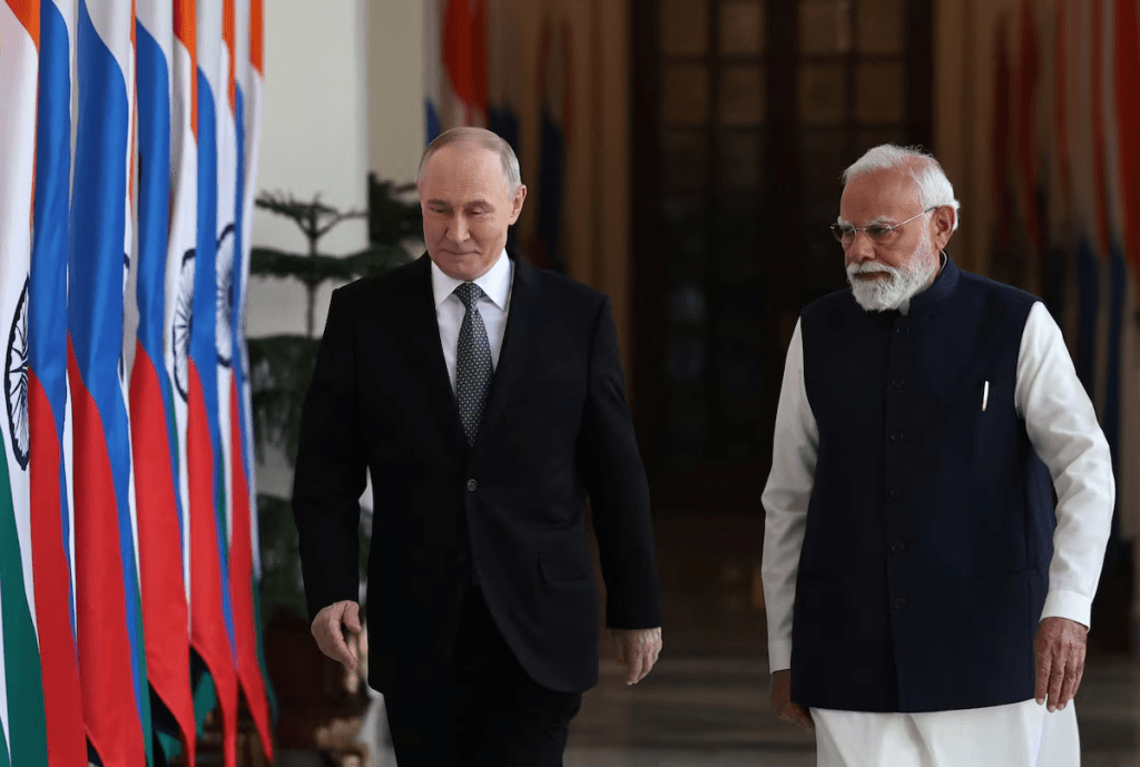 Russia's President Vladimir Putin and India's Prime Minister Narendra Modi walk ahead of their talks in New Delhi, India, December 5, 2025. Sputnik/Alexander Kazakov/Pool via REUTERS