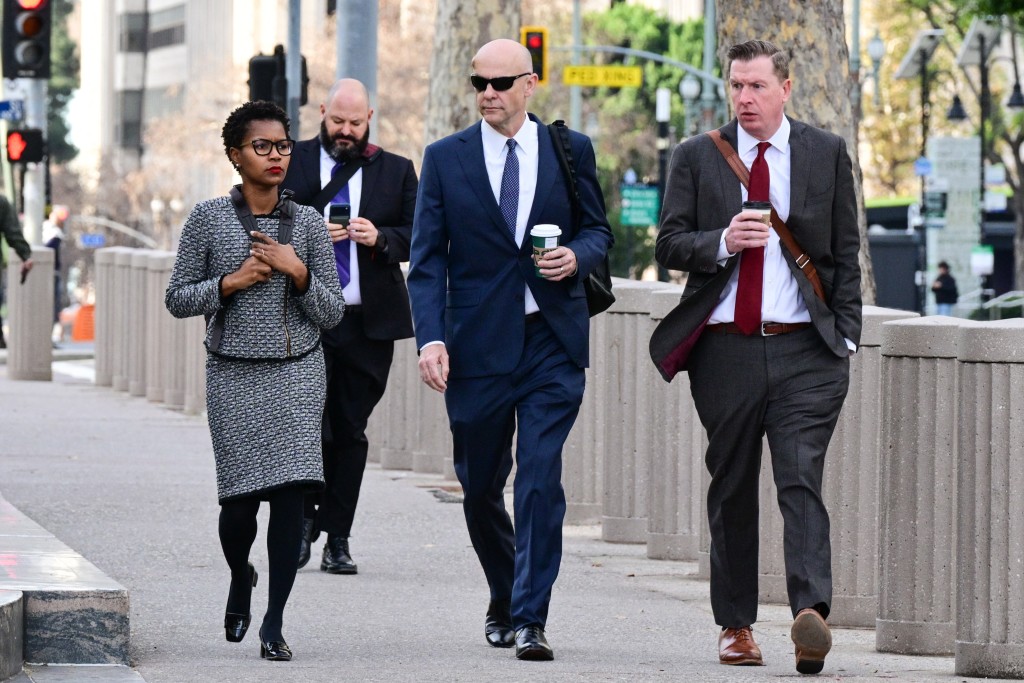 Photo by FREDERIC J. BROWN / AFP  Attorneys Phyllis Jones (L) and Paul Schmidt (C), representing Meta, arrive at the Los Angeles County Superior Court in Los Angeles on February 9, 2026.