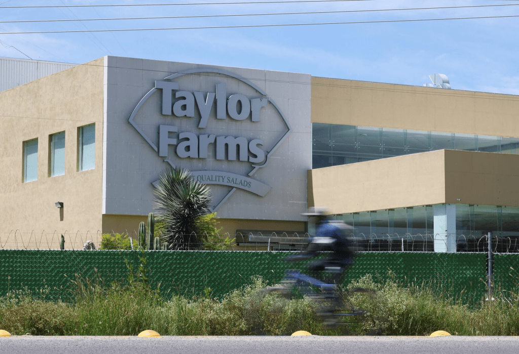 A cyclist rides past the installations of U.S. supplier Taylor Farms following the temporary closure announced by Taylor Farms, in Doctor Mora, Guanajuato state, Mexico, July 24, 2026. REUTERS/Daniel Becerril