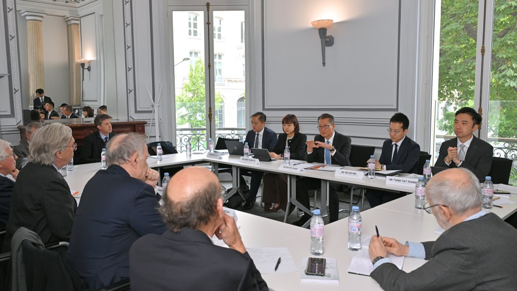 Financial Secretary Paul Chan (third right), met with board members of think tank Asia Centre Paris.