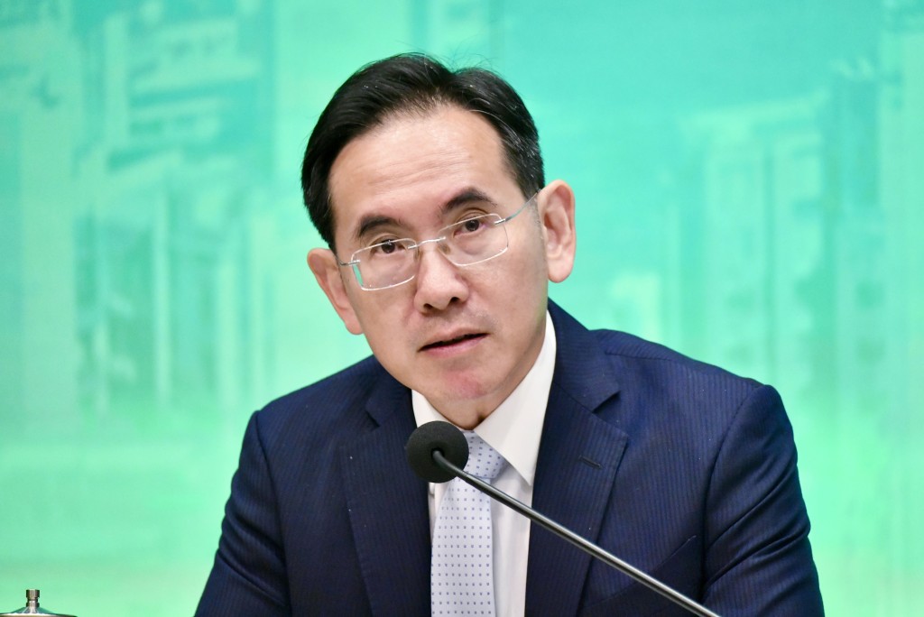 Acting Secretary for Development David Lam. Sing Tao