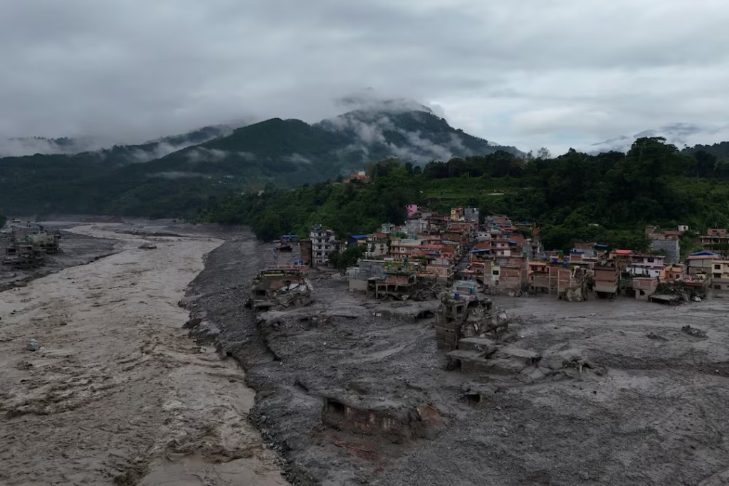 A drone view shows mud covering properties following a flash flood in Trishuli, Nuwakot district, Nepal, August 27, 2026. REUTERS/Navesh Chitrakar