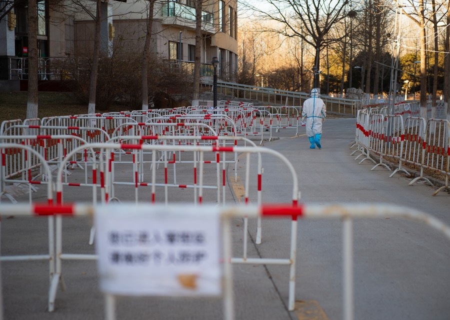 A medical worker is seen at a quarantine hotel in Shunyi District of Beijing, December 31, 2020. A medical worker is seen at a quarantine hotel in Shunyi District of Beijing, December 31, 2020.