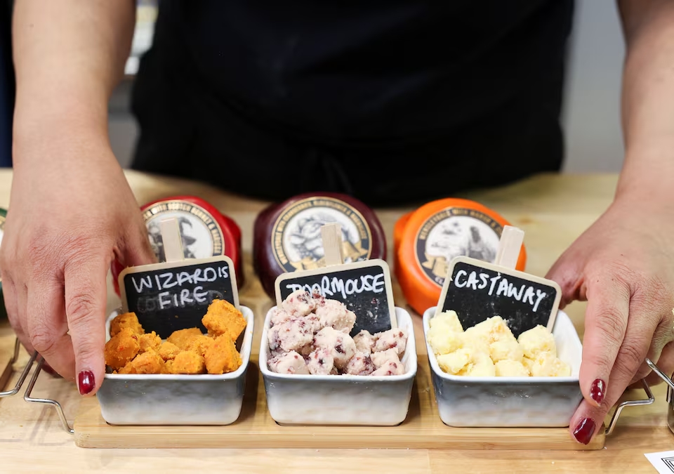 An exhibitor displays a variety of cheese at the Food and Drink Expo 2025 at the NEC in Birmingham, Britain April 7, 2025. (Reuters)