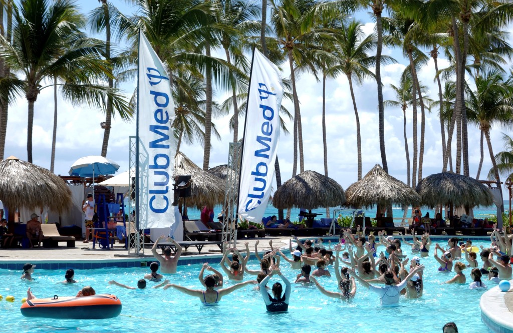 Club Med banners blow in the wind beside the swimming pool at the Club Med Punta Cana vacation resort in the Dominican Republic, March 3, 2016.  REUTERS