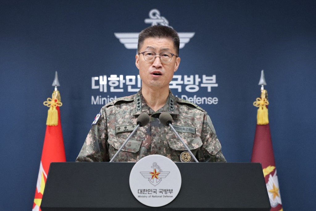 Photo by - / YONHAP / AFP. South Korean Lieutenant General Kang Hyun-Woo, chief director of operations at the Joint Chiefs of Staff (JCS), speaks to reporters during a press briefing at the Defence Ministry in Seoul on September 30, 2026.